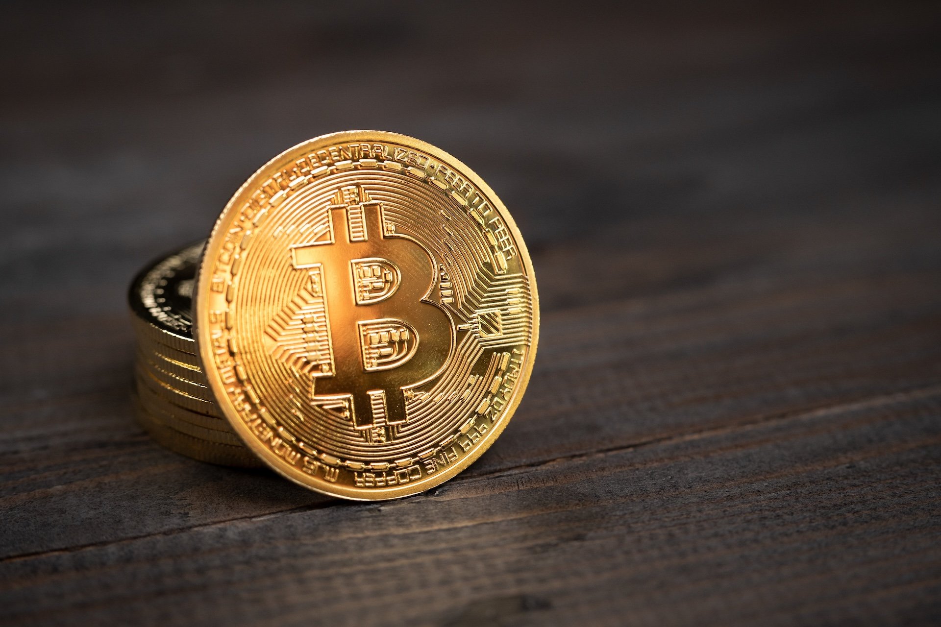 Close,up,of,a,shiny,bitcoin,btc,cryptocurrency,coin,on