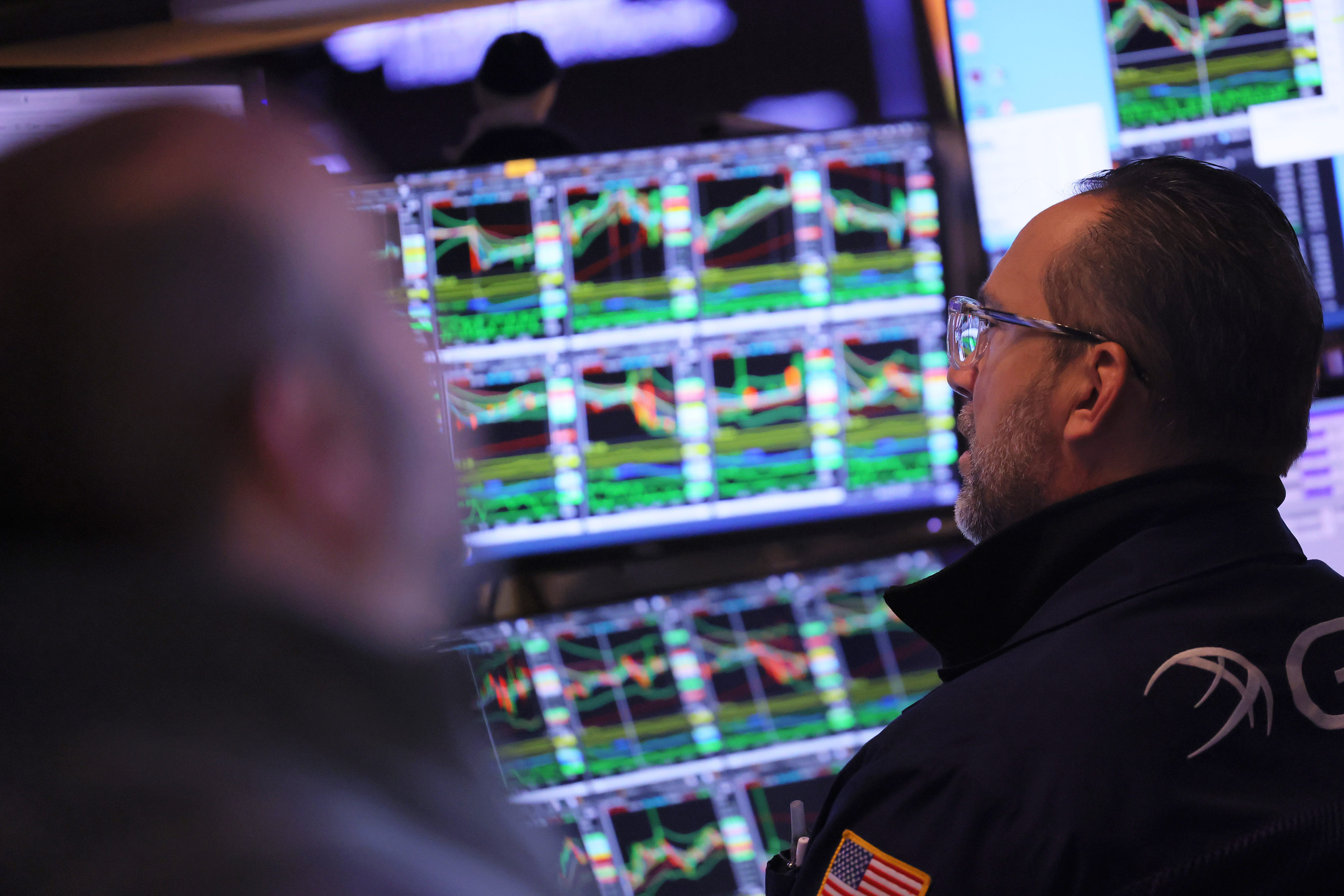 Wall Street traders on the floor of the New York Stock Exchange.