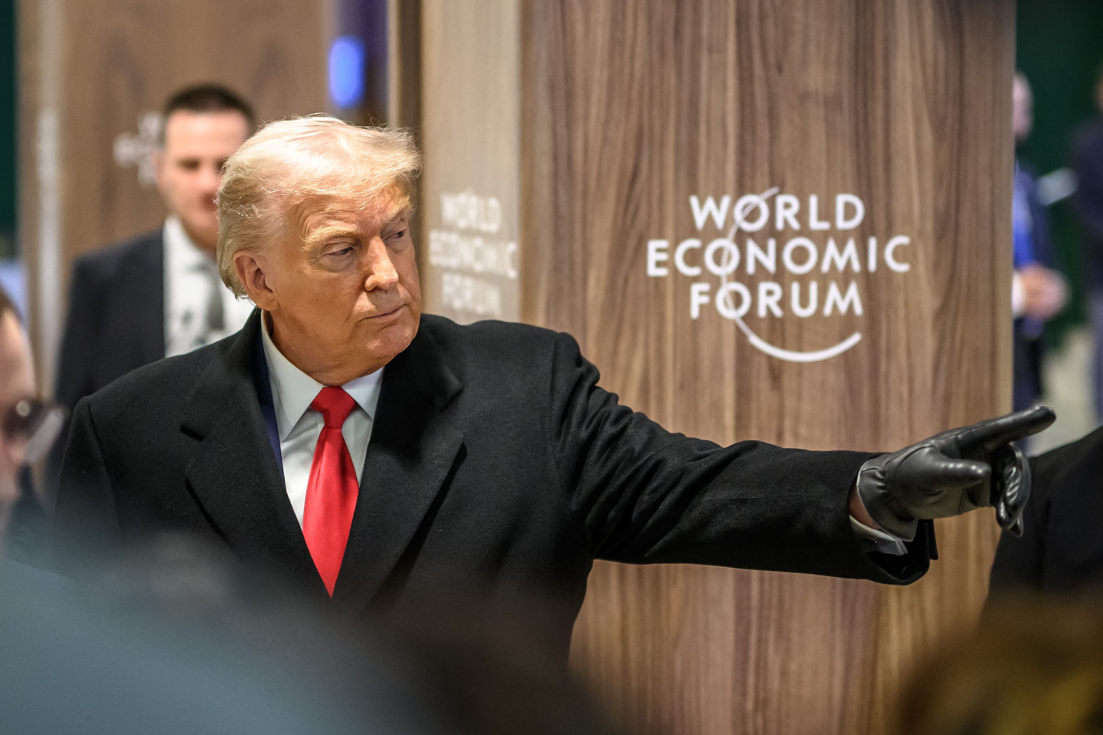 US President Donald Trump gestures as he leaves the congress centre during the World Economic Forum (WEF) annual meeting in Davos on January 21, 2026.