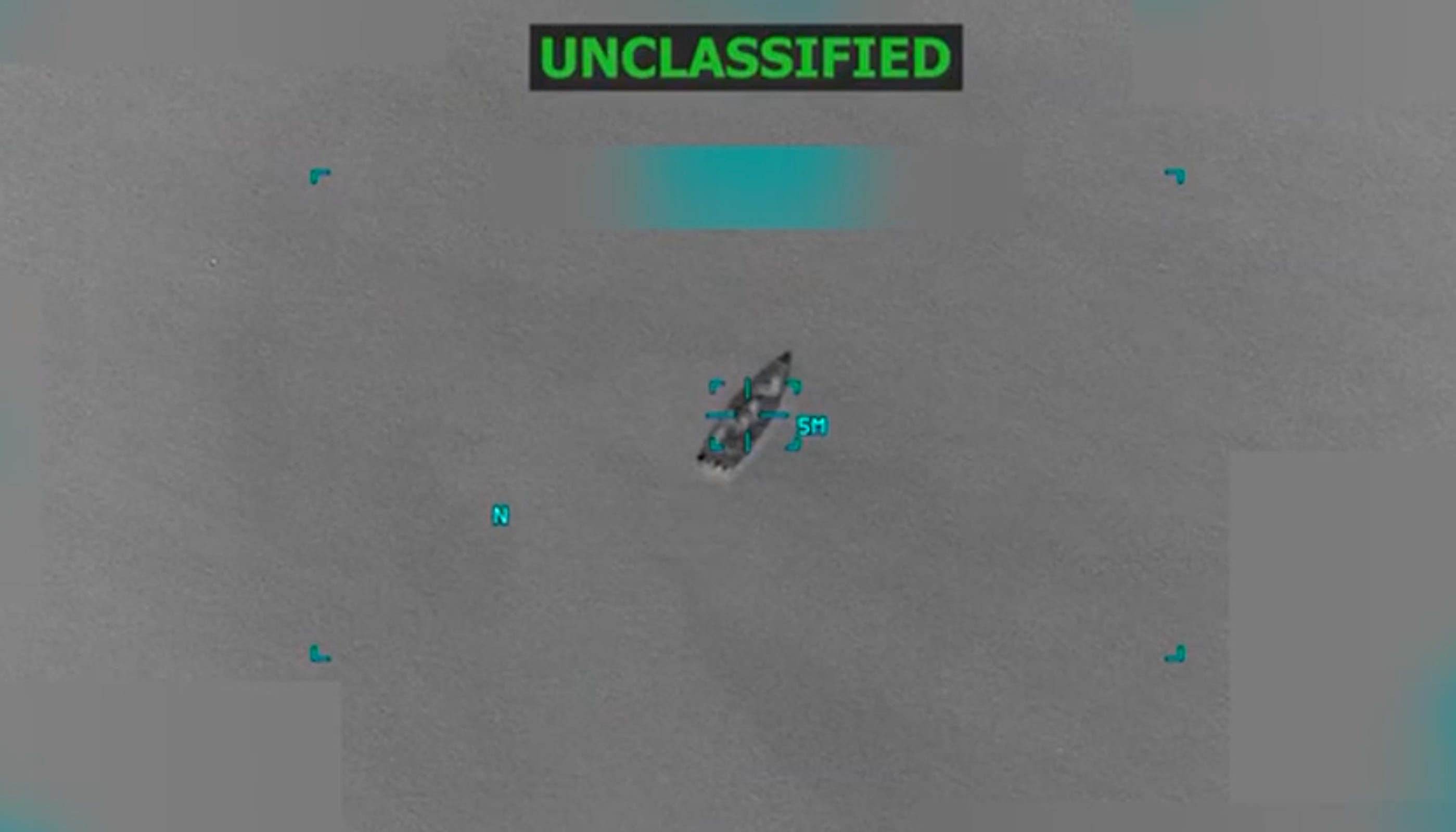 A screenshot from a video of a US strike on a vessel.