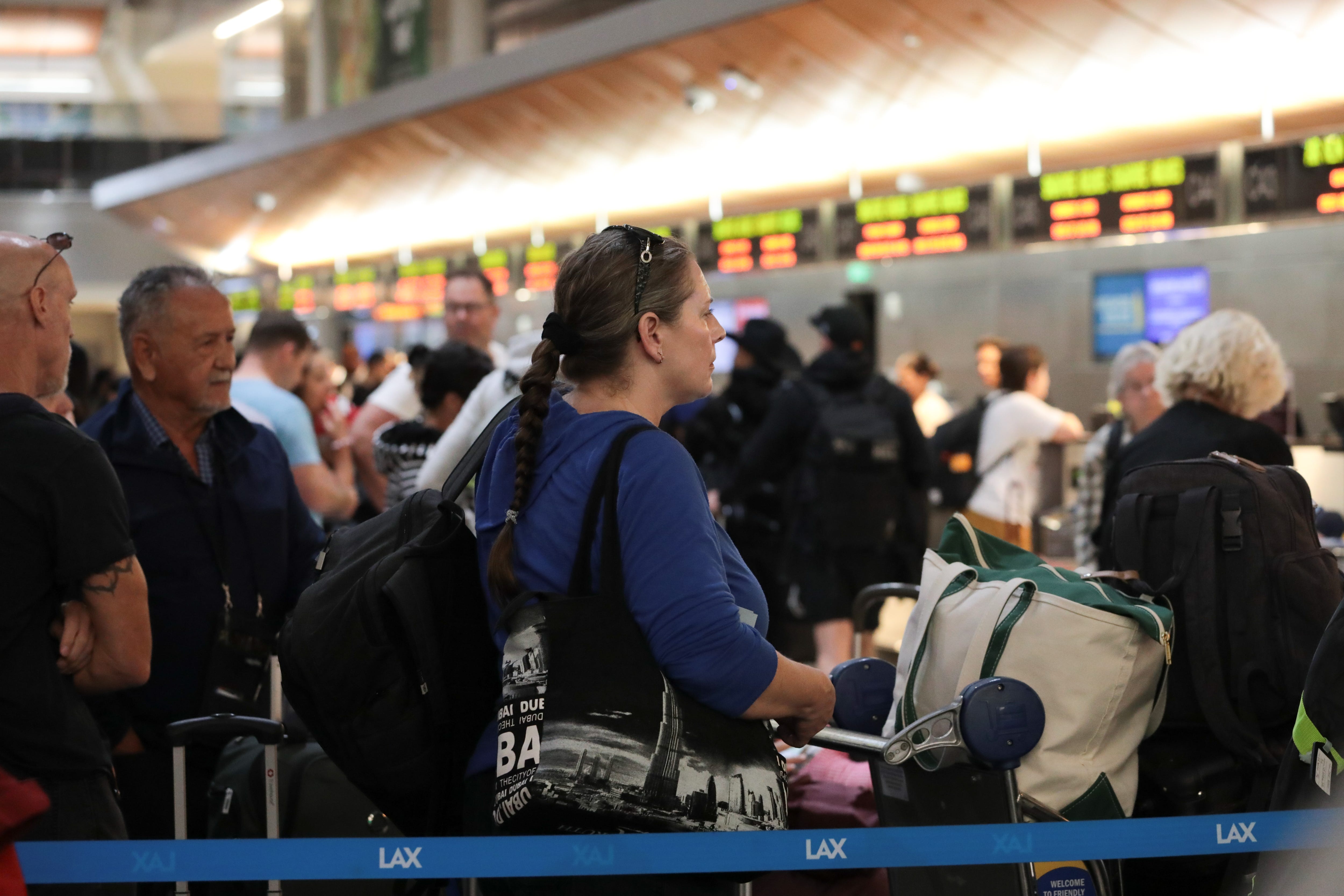 Passengers navigate the busy terminals of Los Angeles during the shutdown.